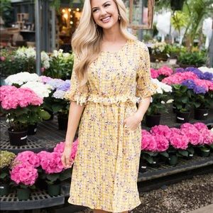 Neesee’s yellow gingham floral dress